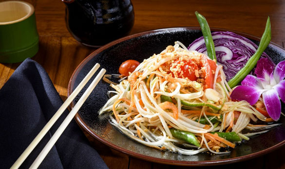 Chef Bee says his Papaya Salad captures the essence of his Thai childhood and brings those bold flavors to the table at NaiYaRa