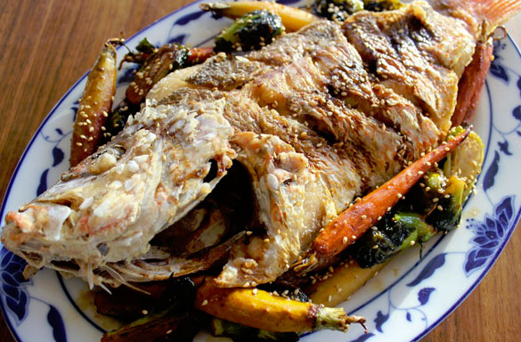 Whole Red Snapper with lemon, chard, Brussels sprouts and baby carrots