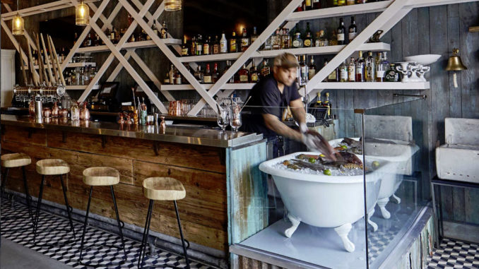 A clawfoot bathtub showcases the catch of the day at Stiltsville